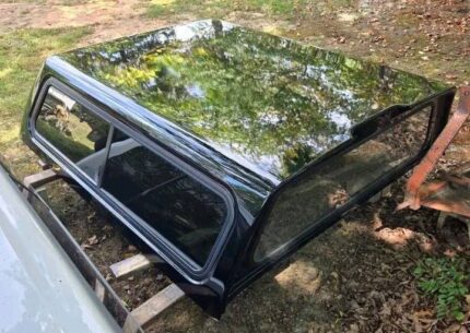 Used Ford F150 Fiberglass truck cap that fits a 2015 to 2020 Ford F150 with a 6.5' bed